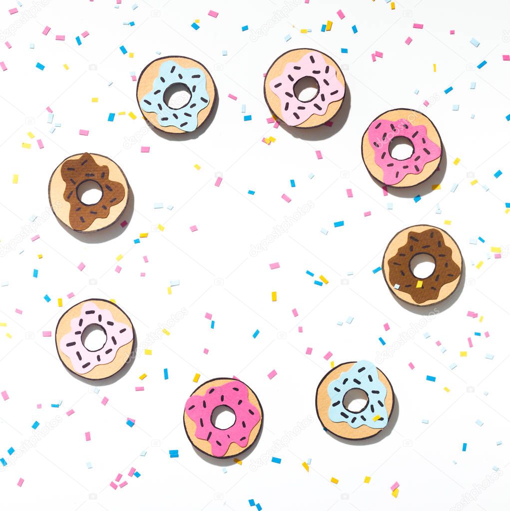 Sweet wallpaper with round composition of fresh donuts