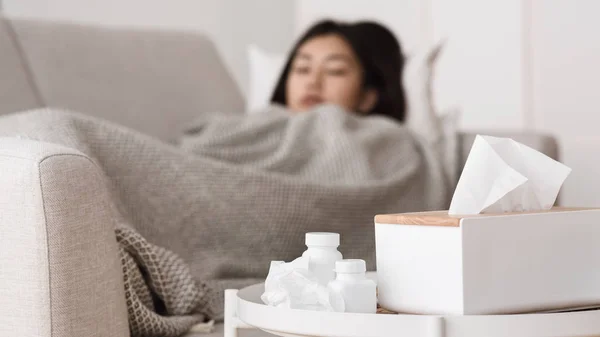 Sick Asian Woman Sleeping with Medicine on Foreground — Stock Photo, Image