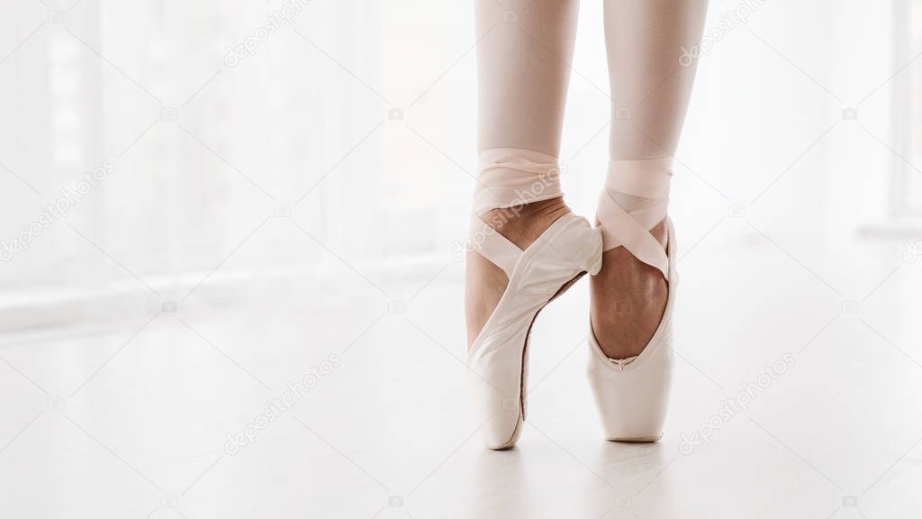Ballerina Legs On Pointe Closeup. Classic And Modern Ballet Conc
