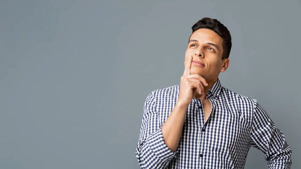 Mused and Dreamy Guy Touching His Chin While Thinking — Stock Photo, Image