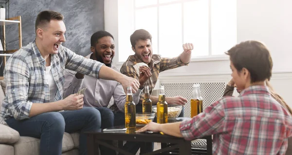 Group of multinational friends playing cards together — Stock Photo, Image