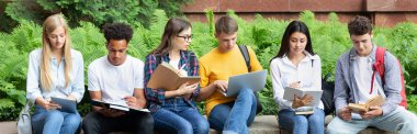 Preparing for lecture. Teens sitting in university campus clipart
