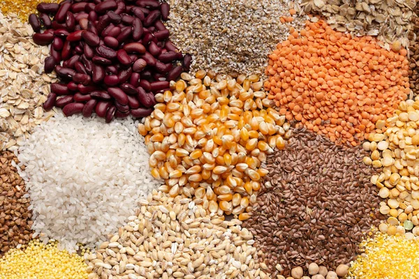 Close up of healthy grains, beans on background — Stock Photo, Image