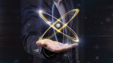 Erkek elinde atomhologram, panorama