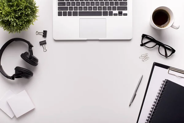 Modern place for work with laptop, headphones and stationery — Stock Photo, Image