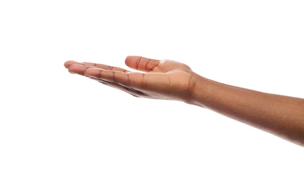 Outstretched female hand, empty palm over white background — Stock Photo, Image