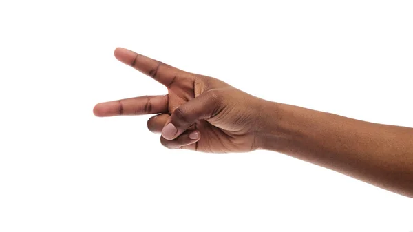 Beyaz arka planda iki parmak, barış veya v işareti gösteren kadın el — Stok fotoğraf