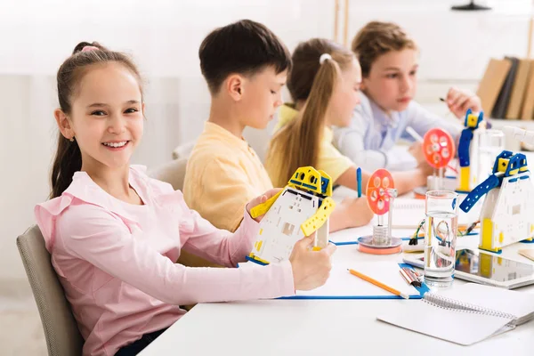 Stem education. Girl creating robot at lab — Stock Photo, Image