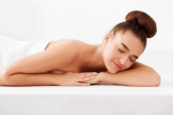 Spa and wellness. Woman relaxing with closed eyes