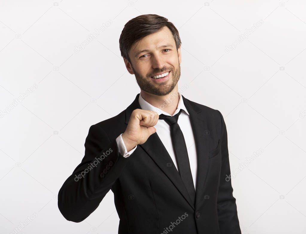 Confident Businessman Pointing Thumbs At Himself, Isolated