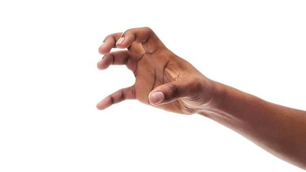 Preto feminino mão agarrar alguns itens no branco isolado fundo — Fotografia de Stock