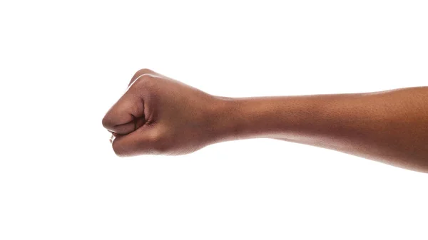 Чорна жіноча рука, що показує згорнутий кулак на білому тлі — стокове фото