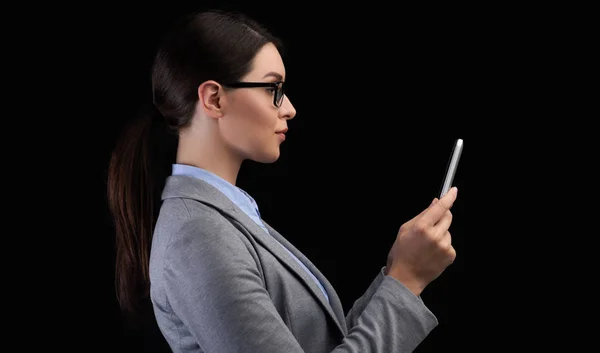 Businesswoman Using Smartphone Face Recognition System On Black Background