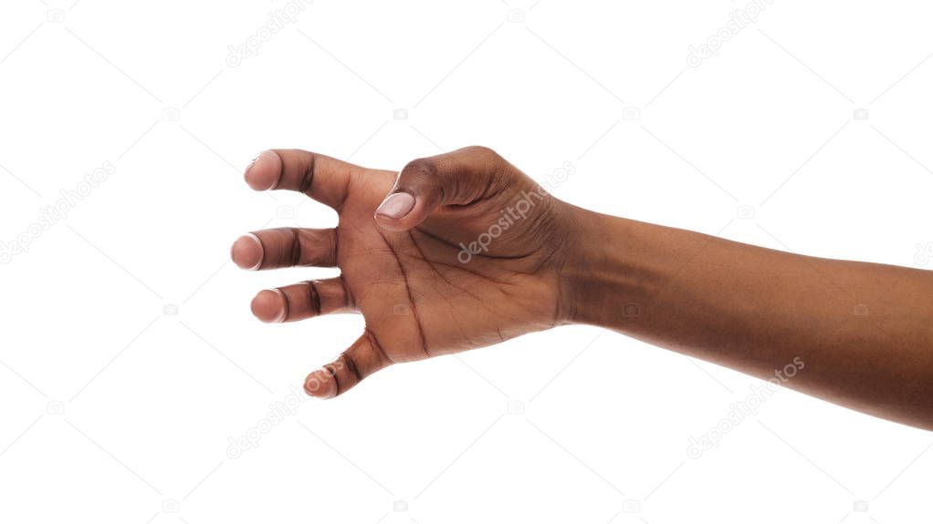 Afro womans hand grabbing something invisible on white background