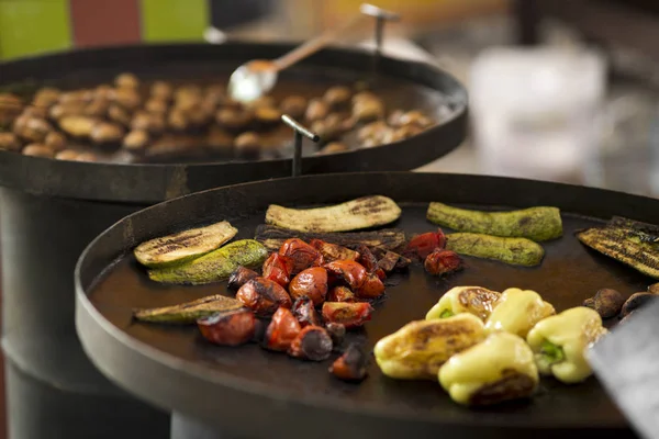 Hot grilled vegetables prepared for sale outdoor