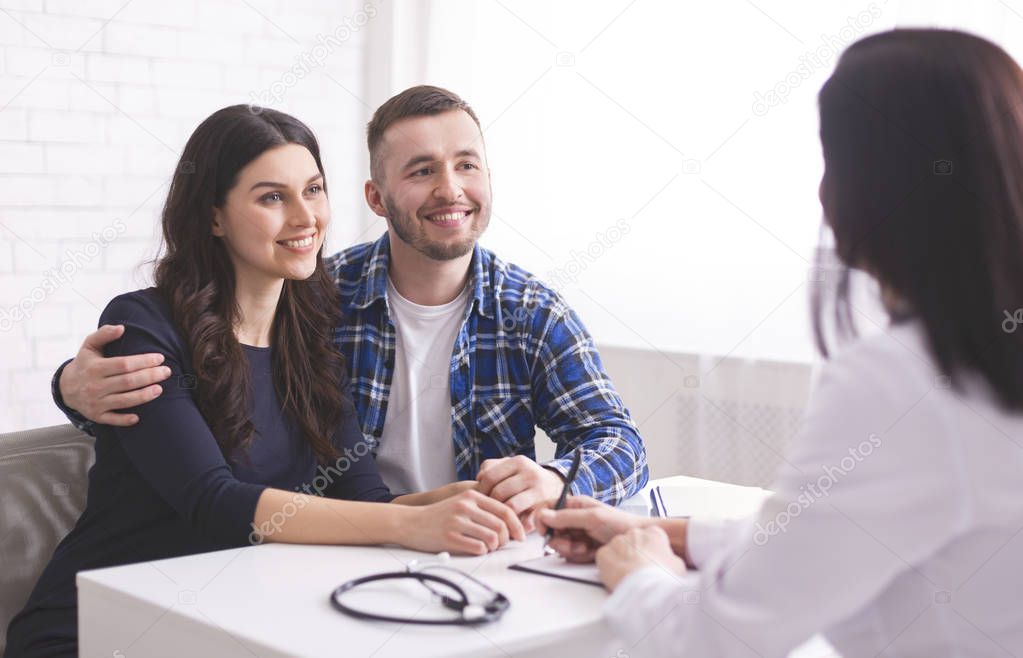 Young couple at doctors appointment at clinic