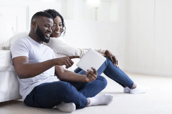 Millennial couple watching funny videos on digital tablet at home - Stock  Image - Everypixel