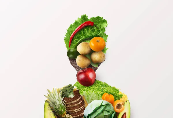 Friss zöldségfélék, gyümölcsök és teljes kiőrlésű termékek asszonya — Stock Fotó