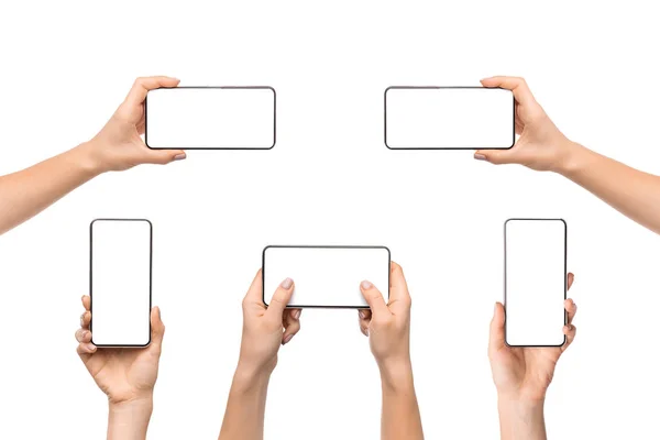 Collection de mains féminines tenant un téléphone intelligent avec écran vide — Photo