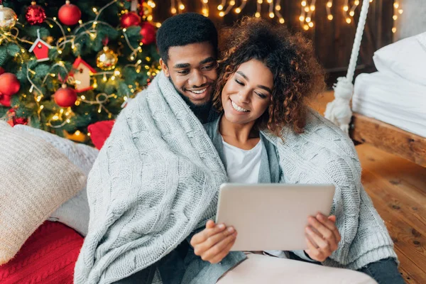 Couple in love making video call on a tablet