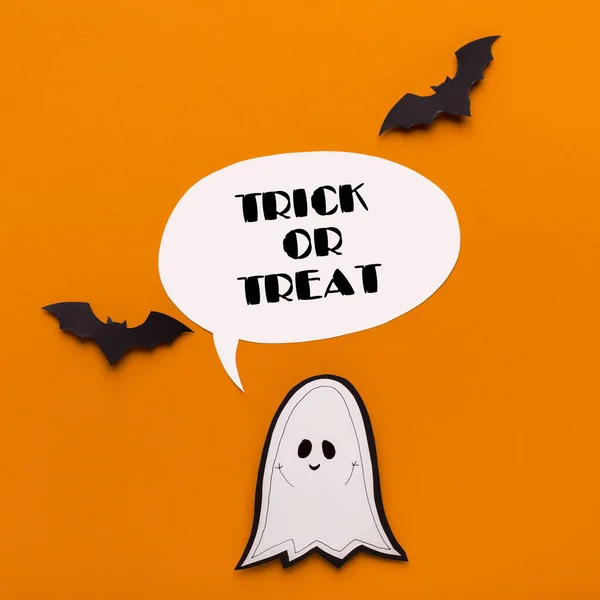 Halloween cute ghost with bats and text on orange