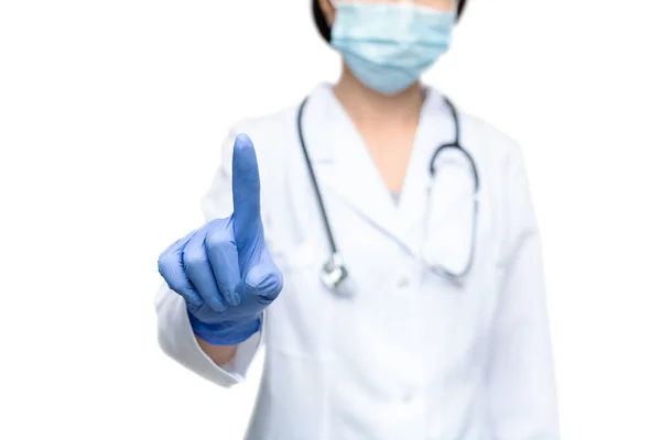Woman doctor pointing at invisible screen, warning about flu — Stock Photo, Image