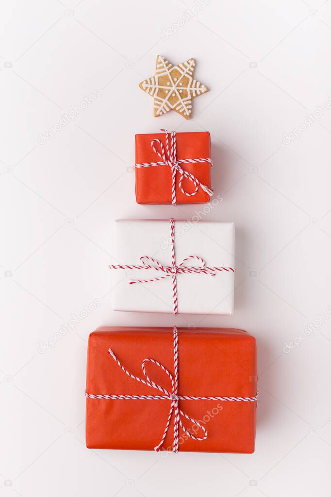 Gift boxes in shape of Christmas tree with star on the top