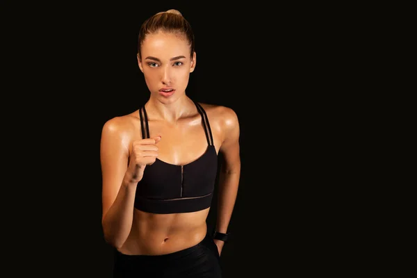 Motivated Woman Jogging In Place Exercising During Workout, Studio Shot — Stock Photo, Image