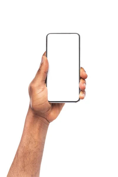 Black Man hand demonstrating modern frameless smartphone with blank screen — стоковое фото