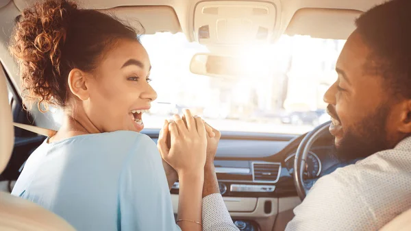 Cheerful African American Spouses Holding Hands Sitting In Auto, Panorama