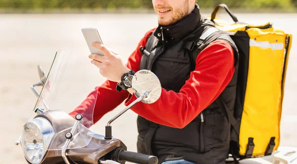 Unrecognizable Courier Using Phone Delivering Meals Riding Scooter Outdoor, Panorama — Stock Photo, Image