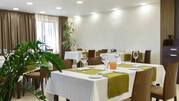 Interior of empty restaurant with green plants