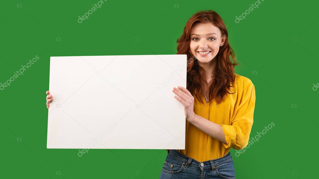 Cheerful Girl Showing Empty Poster Over Green Background, Panorama, Mockup