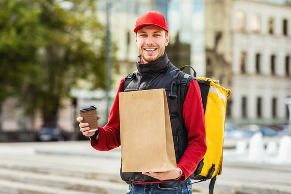 Courier Man Delivering Meal Walking With Backpack In Urban Area