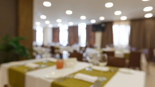 Blurred photo of hotel dining room with light — Stock Photo, Image