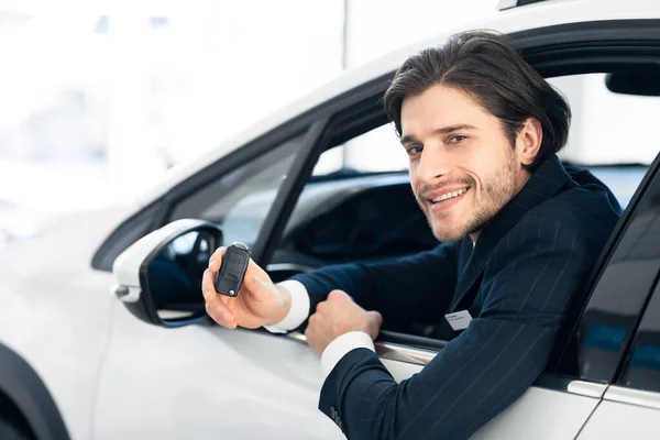 Seller Showing Car Key Sitting In Automobile — Stock Photo, Image