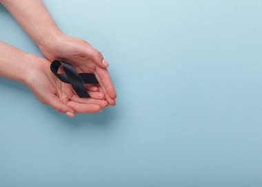 Melanoma ve Cilt Kanseri Farkındalığı Kurdelesi. Umut