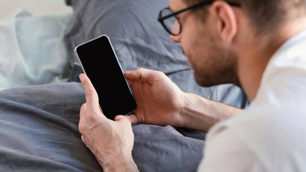 Man Using Cellphone Lying In Bed At Home, Mockup, Panorama — Stock Photo, Image