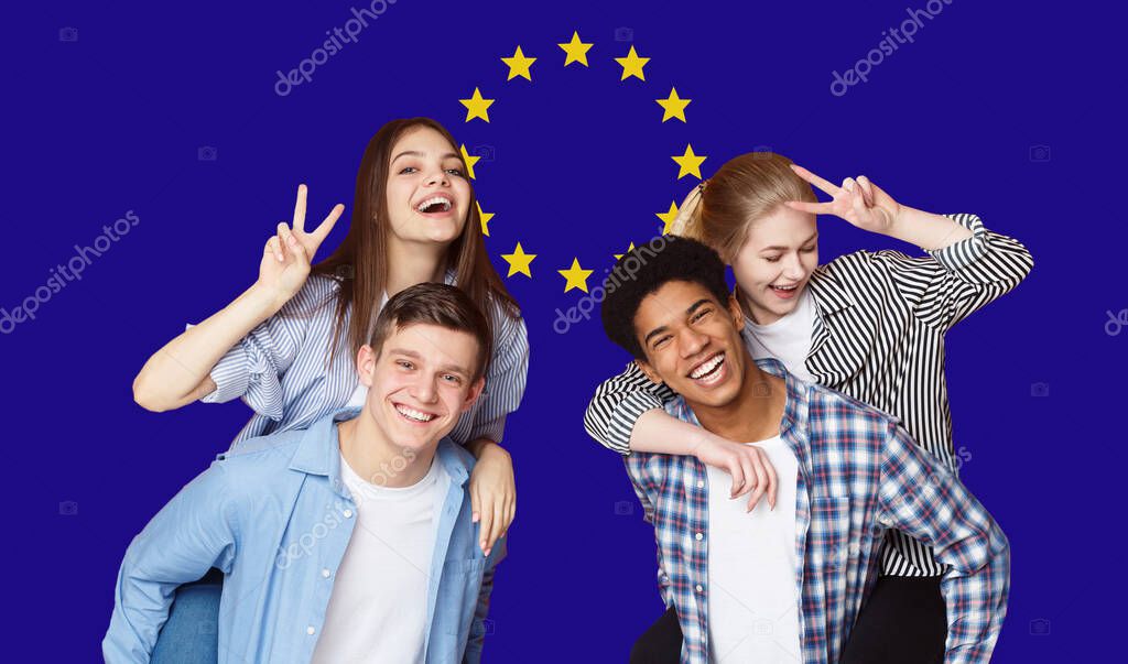 Group Of Happy Multi Ethnic Students Standing Over EU Flag Background, Cheerful Teens Enjoying Education In Europe Union, Panorama