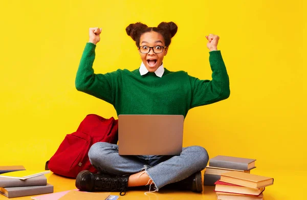 Excited african american teenager celebrating her victory — Stock Photo, Image