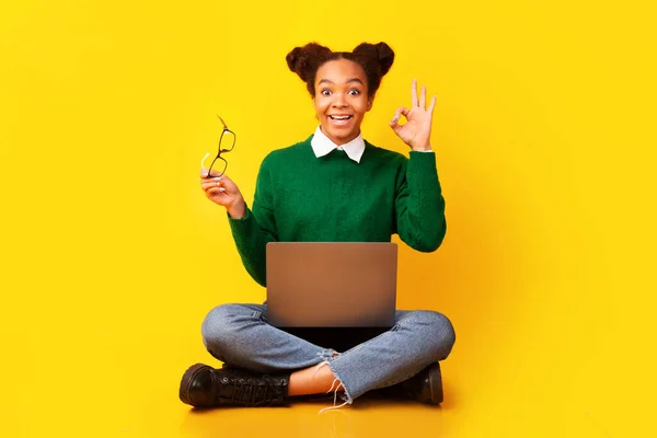 Happy afro teenager showing ok sign gesture — Stock Photo, Image