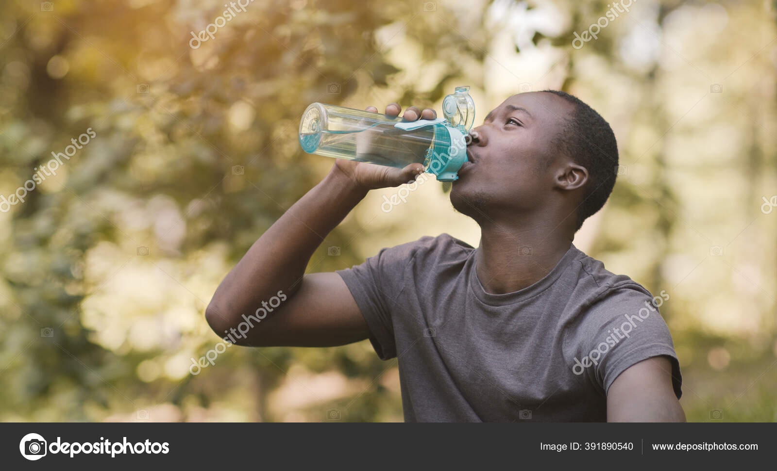 https://st4.depositphotos.com/4218696/39189/i/1600/depositphotos_391890540-stock-photo-young-black-man-drinking-water.jpg