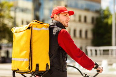 Sarı Sırt çantalı Kurye Bisikletle Dışarıya Yiyecek Teslimatı