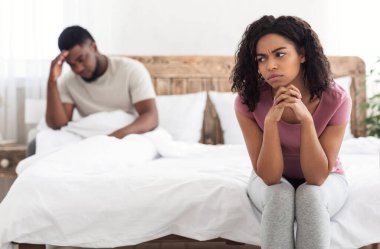 Young married black couple having relationships crisis clipart