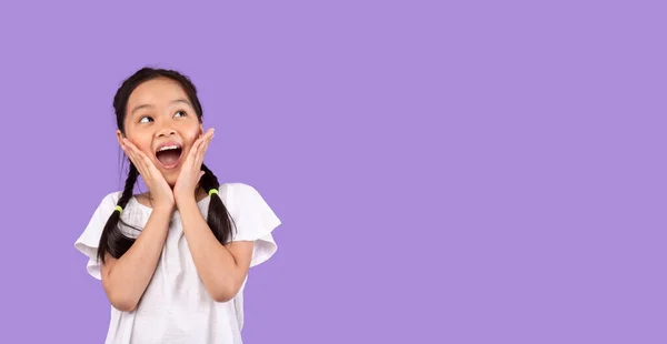 Excited Asian Girl Touching Face Posing Standing On Purple Background — Stock Photo, Image