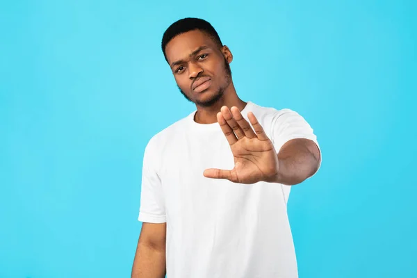 Serious Black Guy Gesturing Stop Standing Over Blue Background — Stock Photo, Image