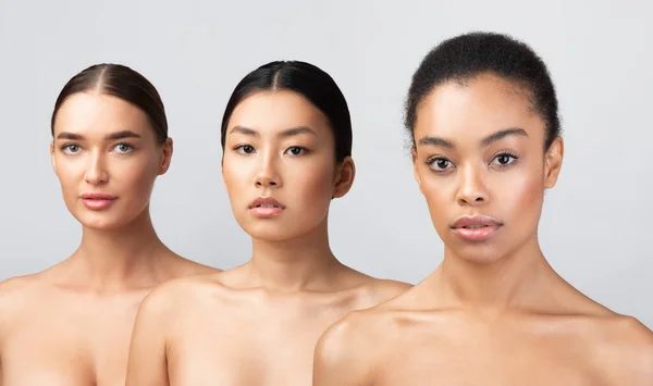 Donne multirazziali con volti perfetti e pelle in posa in studio — Foto Stock