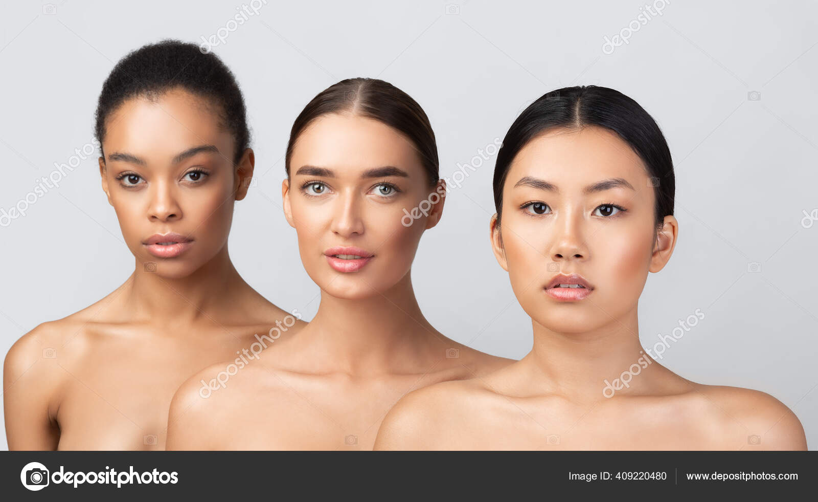 Three Women Posing Naked Standing In Studio On Gray Background Stock