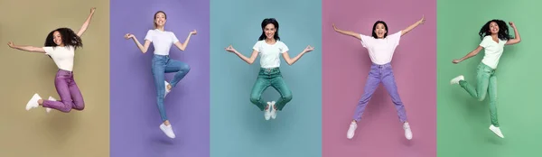 Mulheres multiculturais pulando posando em diferentes posições sobre fundos coloridos — Fotografia de Stock