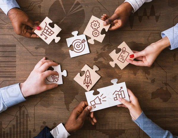Creative Collage With Business People Holding Puzzle Pieces With Marketing Strategy Icons